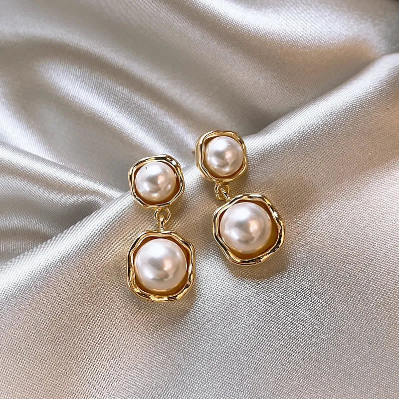Boucles d'oreilles élégantes en or « double perle »