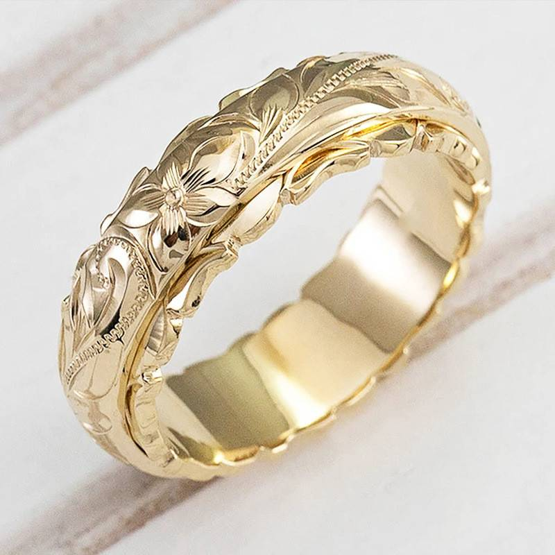Bague vintage en or avec motif naturel