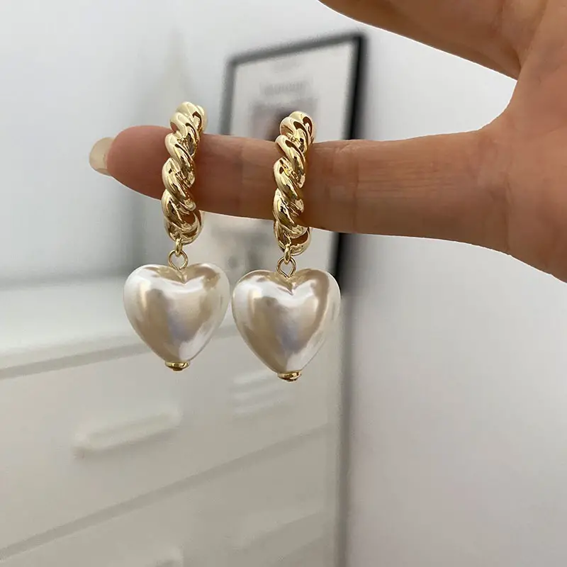 Boucles d'oreilles en forme de cœur élégant avec perles