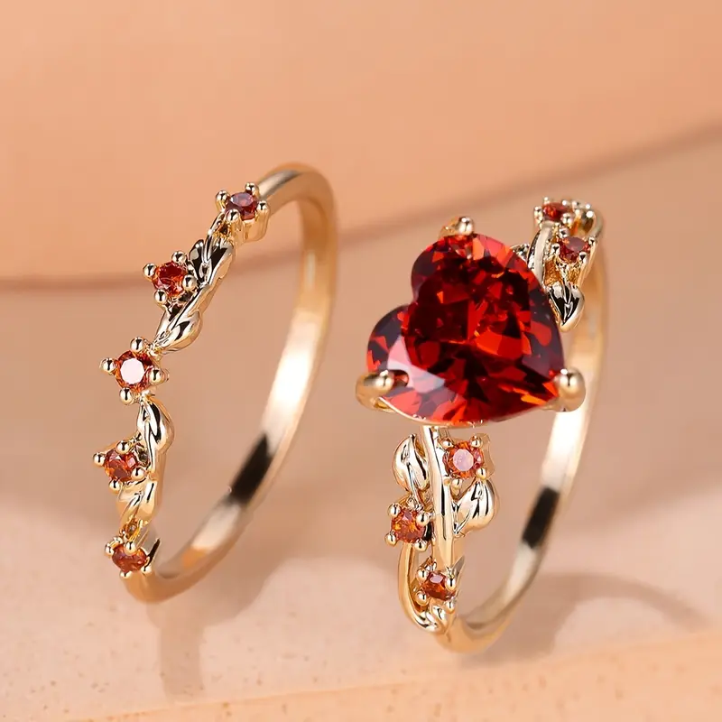 Ensemble de bijoux en or avec cristaux rouges et cœur