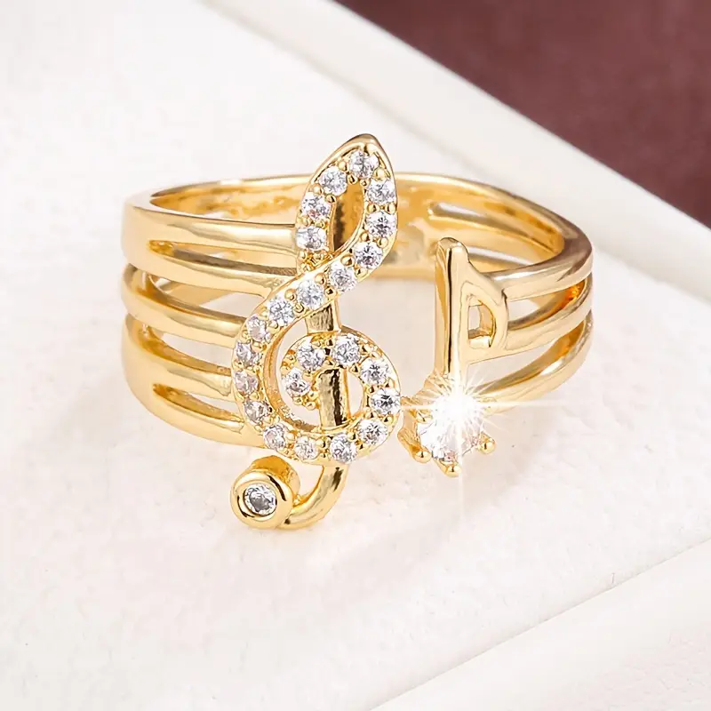 Bague en or avec éléments musicaux