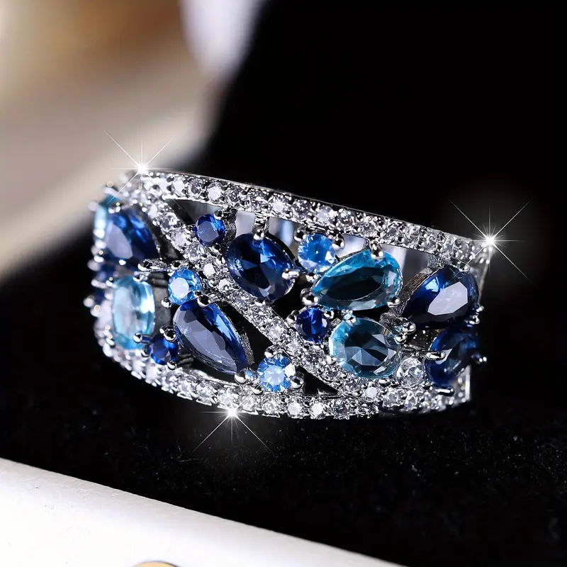 Bague en argent vintage avec des pierres bleues scintillantes