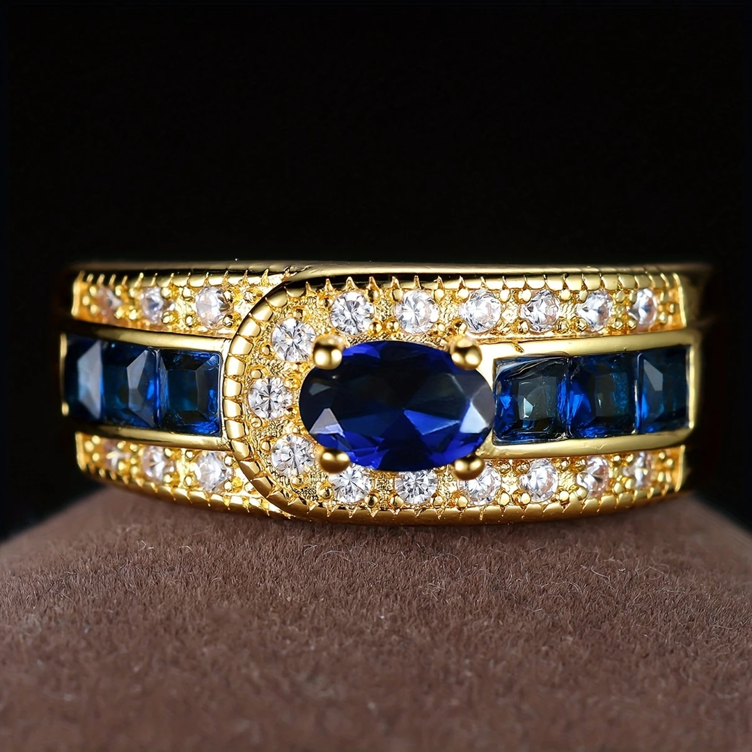 Bague vintage en or avec zirconia et pierres bleues