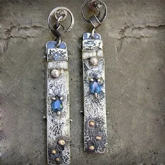 Boucles d'oreilles faites à la main avec des pierres bleues