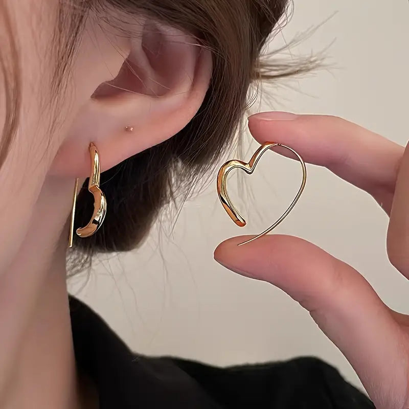 Boucles d'oreilles créoles au motif cœur irrégulier